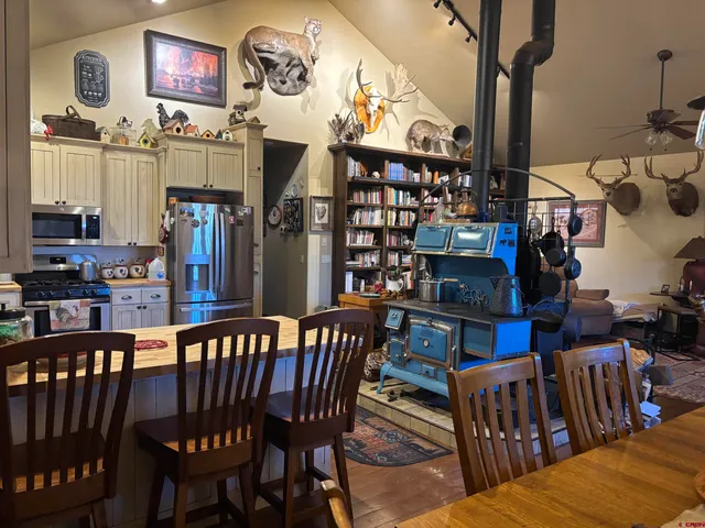 a view of a dining room with furniture