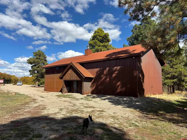 a front view of house with pathway and yard