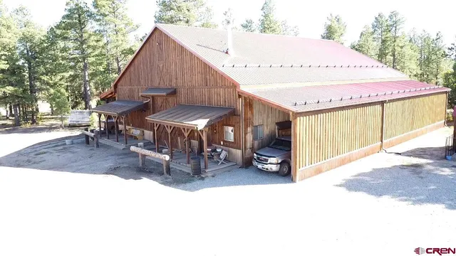 a view of a car park in front of house