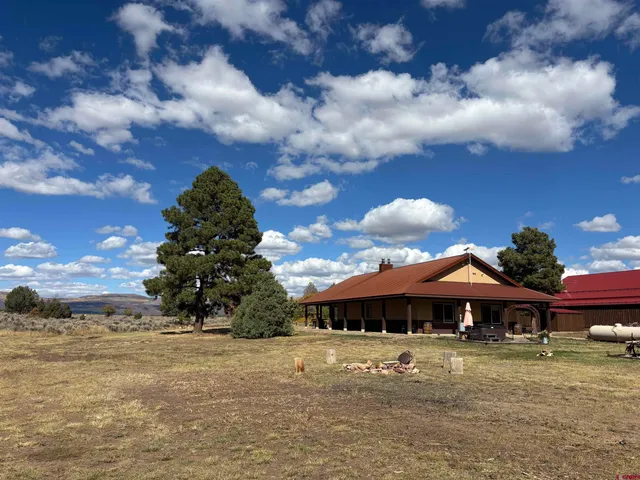 a view of a lake with a yard