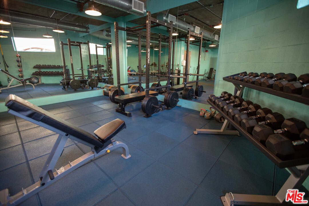 11715 Bellagio Road, Unit 104 Los Angeles, CA 90049 - Photo 26 of 26 a outdoor space with lots of furniture and tub