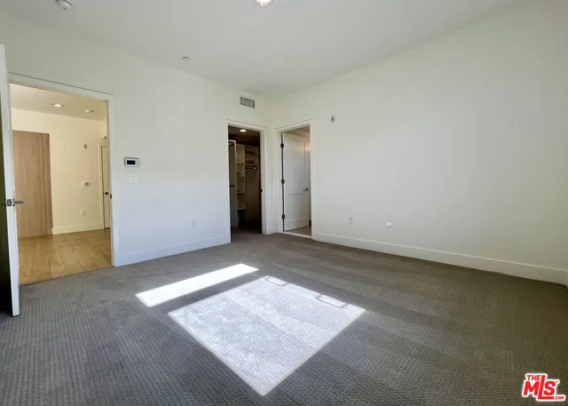 an empty room with an entryway