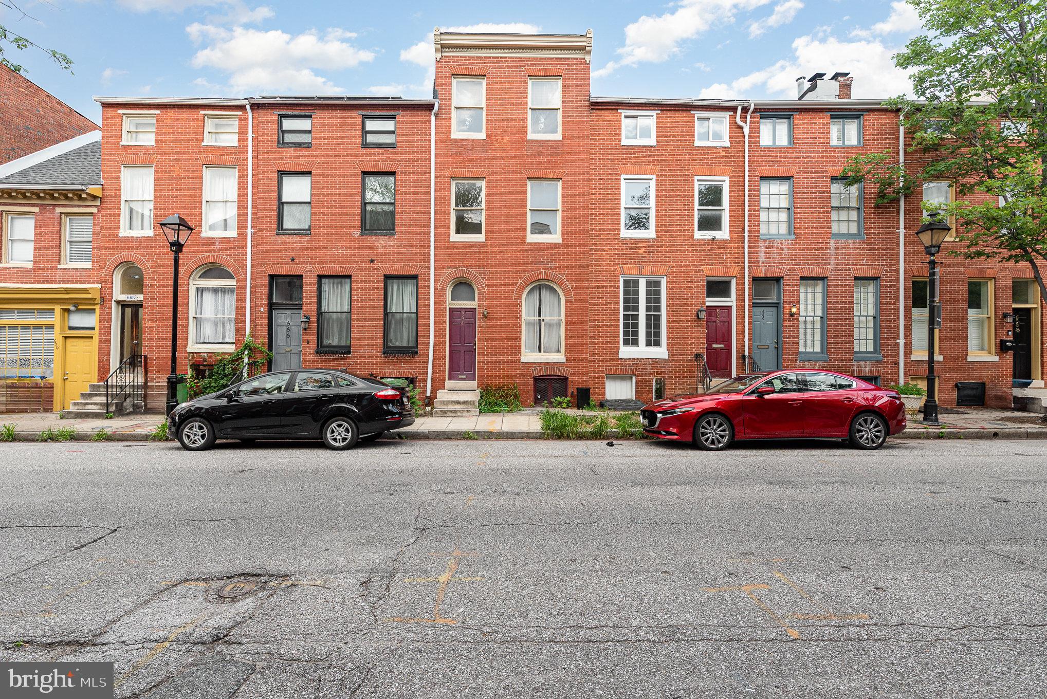664 Washington Boulevard Baltimore, MD 21230 - Photo 1 of 30 a car parked in front of a big building