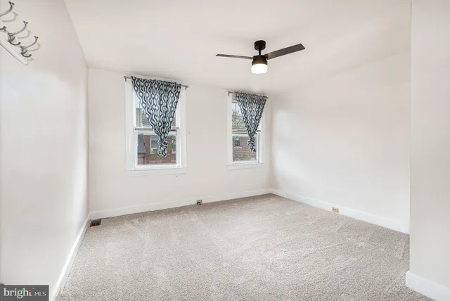a bathroom with a sink double vanity and a mirror