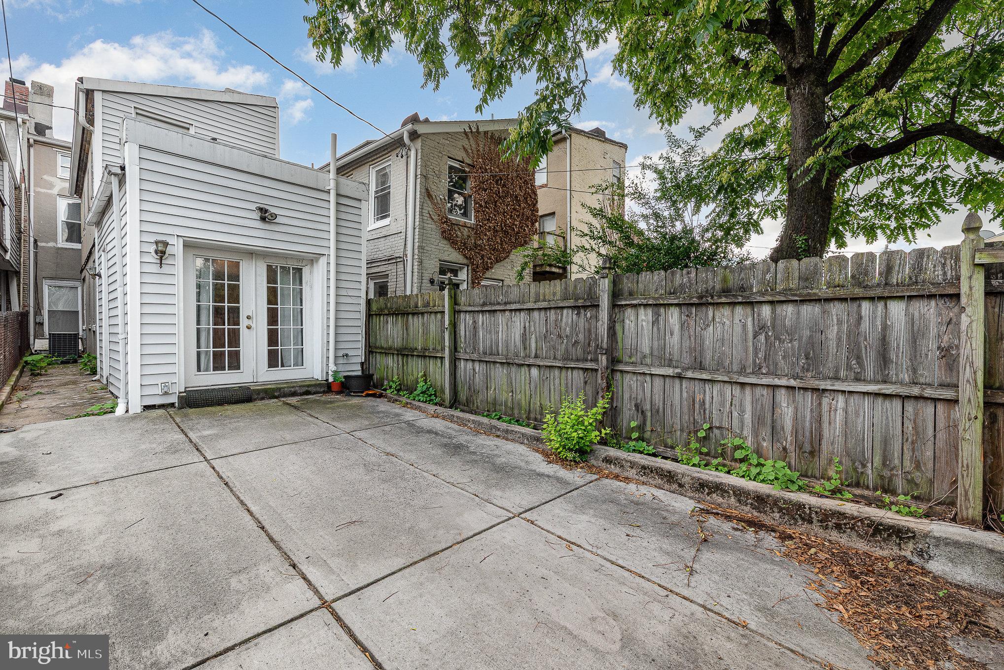 664 Washington Boulevard Baltimore, MD 21230 - Photo 21 of 30 a view of a house with a black gate