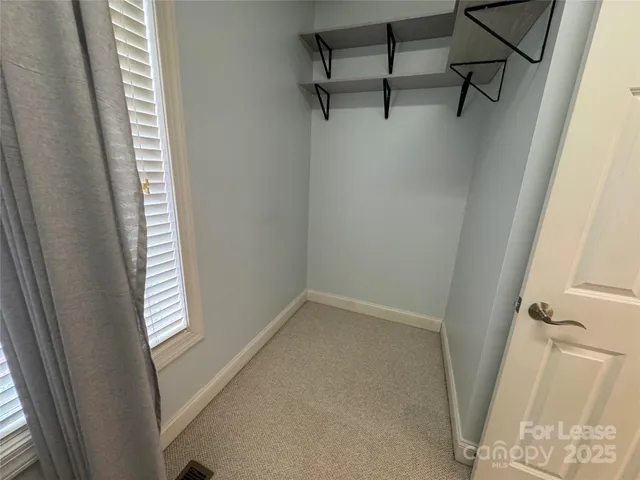 a view of a room with racks on the wall