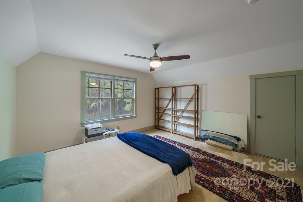 12910 Mayes Road Huntersville, NC 28078 - Photo 22 of 46 a bedroom with a large bed and a window