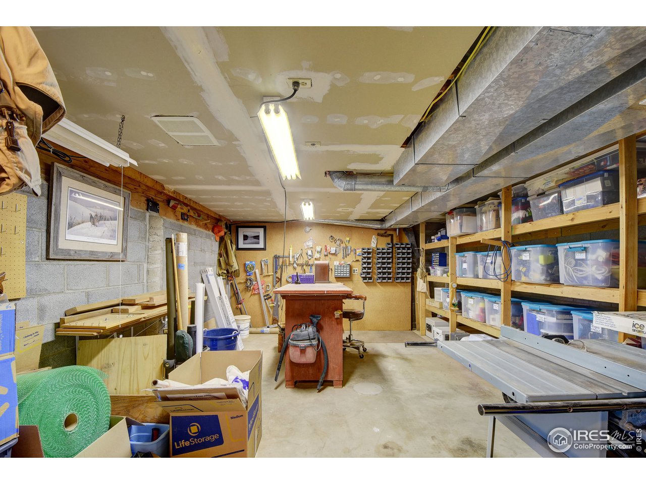 115 Pika Road Boulder, CO 80302 - Photo 26 of 40 Unfinished workshop with storage everywhere