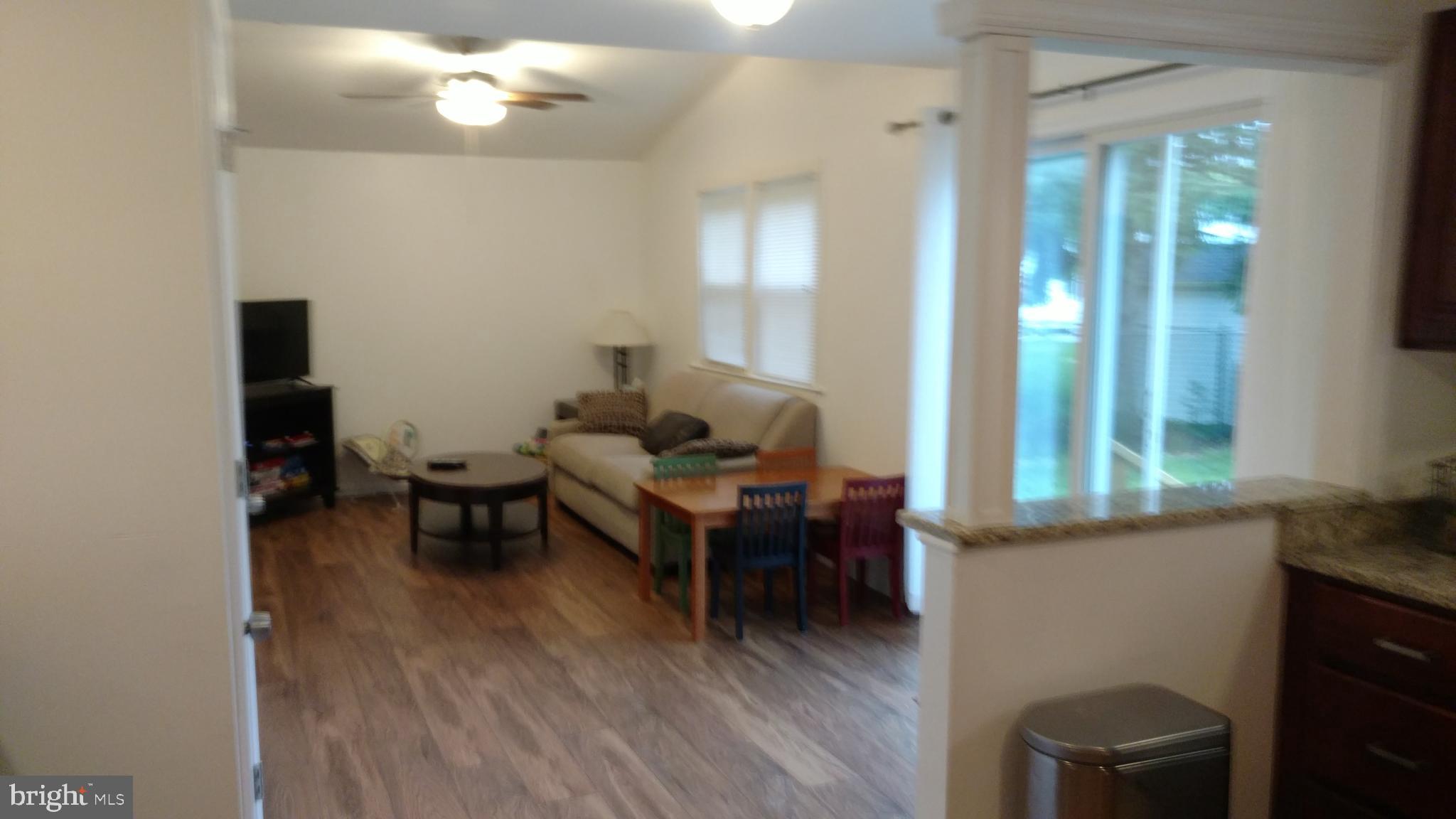 56 Shepherd Road Cherry Hill, NJ 08034 - Photo 4 of 15 Family room sliding glass doors to deck