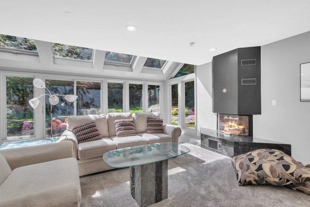 62 Chestnut Street Upton, MA 01568 - Photo 12 of 36 a living room with furniture and a large window