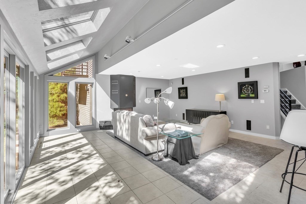 62 Chestnut Street Upton, MA 01568 - Photo 13 of 36 a living room with furniture and a large window