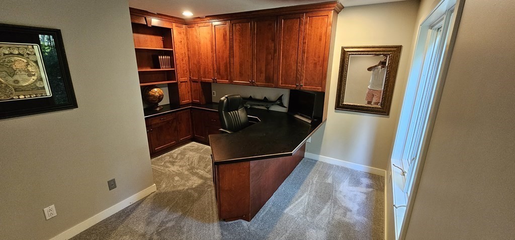 62 Chestnut Street Upton, MA 01568 - Photo 17 of 36 a kitchen with stainless steel appliances granite countertop a refrigerator and a sink