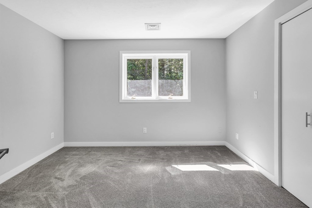 62 Chestnut Street Upton, MA 01568 - Photo 21 of 36 an empty room with a window