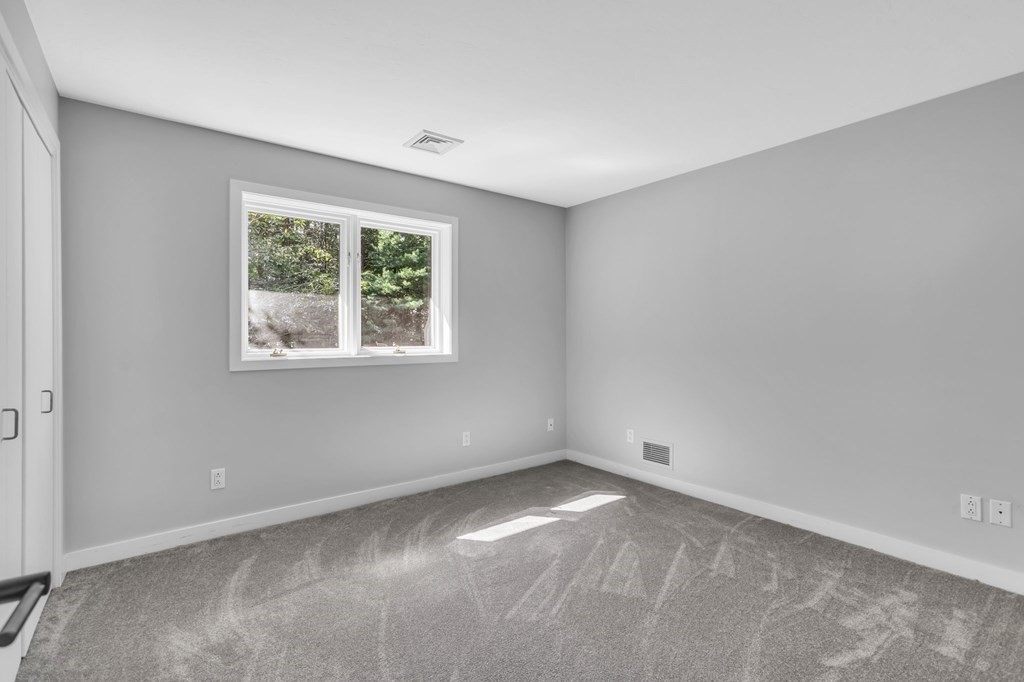 62 Chestnut Street Upton, MA 01568 - Photo 22 of 36 an empty room with a window