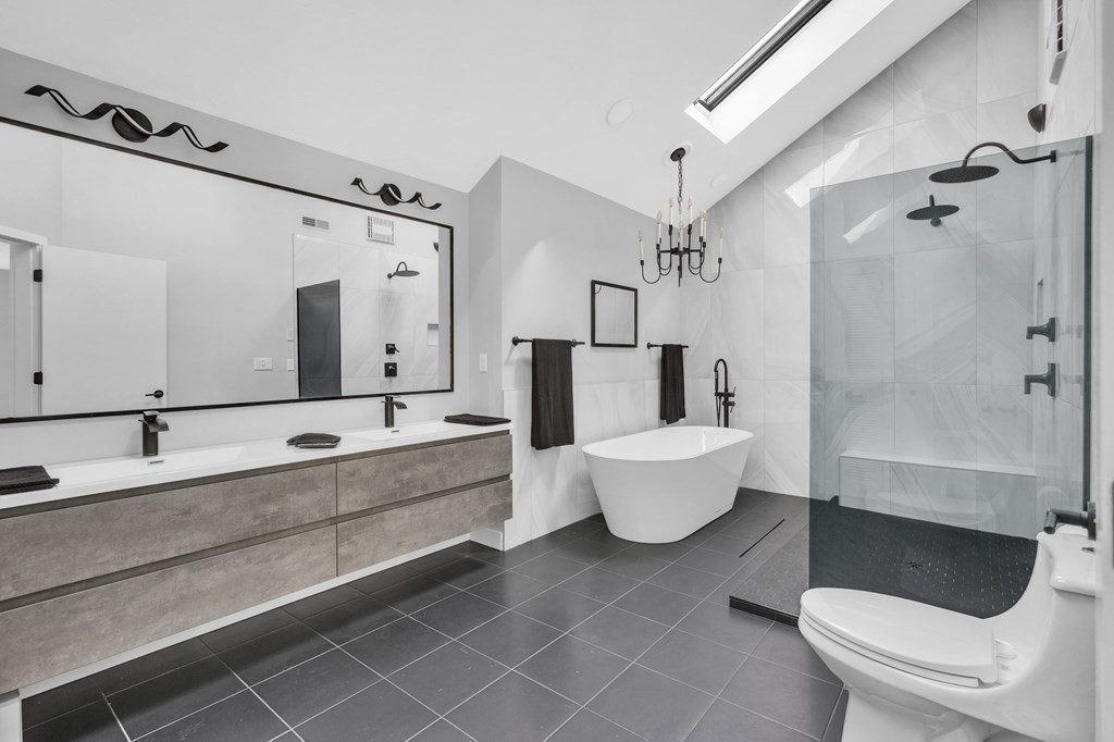 62 Chestnut Street Upton, MA 01568 - Photo 26 of 36 a bathroom with a bathtub sink mirror and toilet