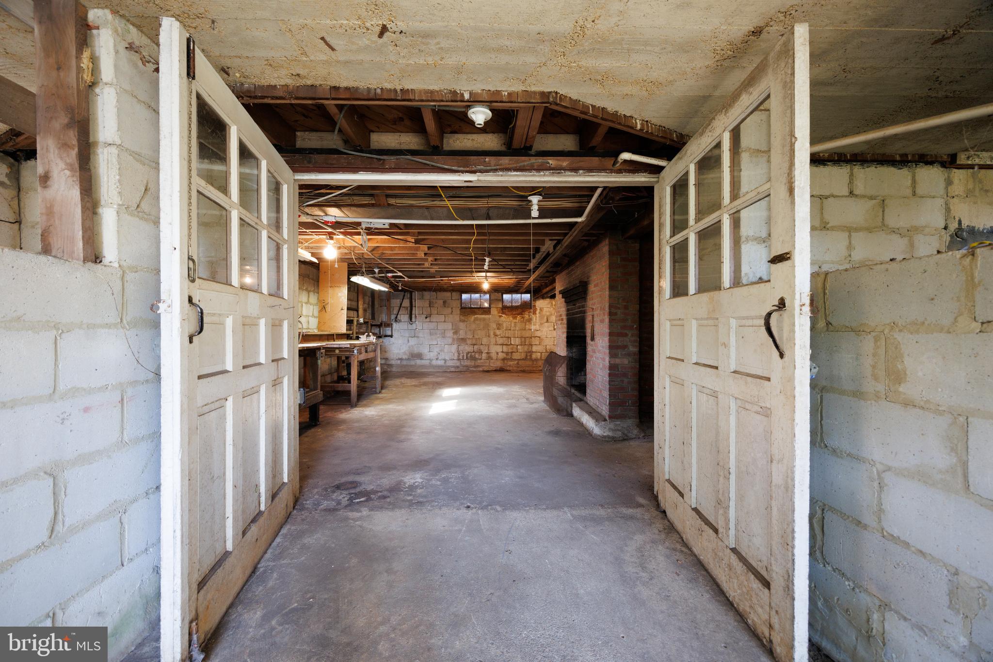 203 McKinsey Road Severna Park, MD 21146 - Photo 124 of 149 Double door entry to small basement boat ramp