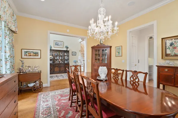 a dining room with furniture and windows