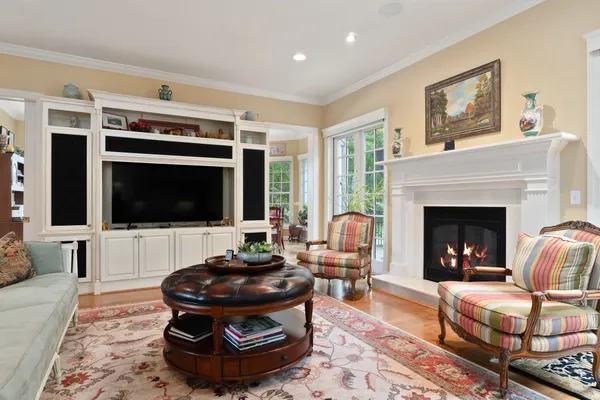 a kitchen with stainless steel appliances granite countertop a sink and a white cabinets