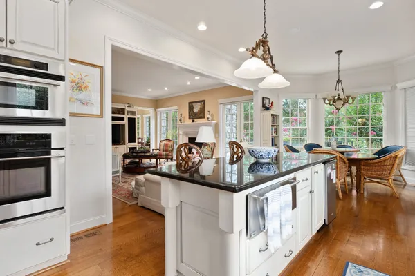 a workspace with furniture and a flat screen tv