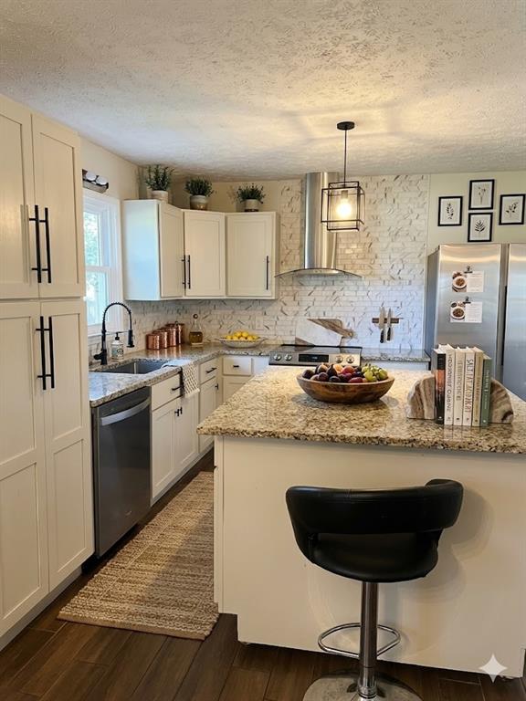 27 Carriage Trace Southeast Cartersville, GA 30121 - Photo 9 of 26 a kitchen with stainless steel appliances granite countertop a sink dishwasher a stove a refrigerator and cabinets with wooden floor