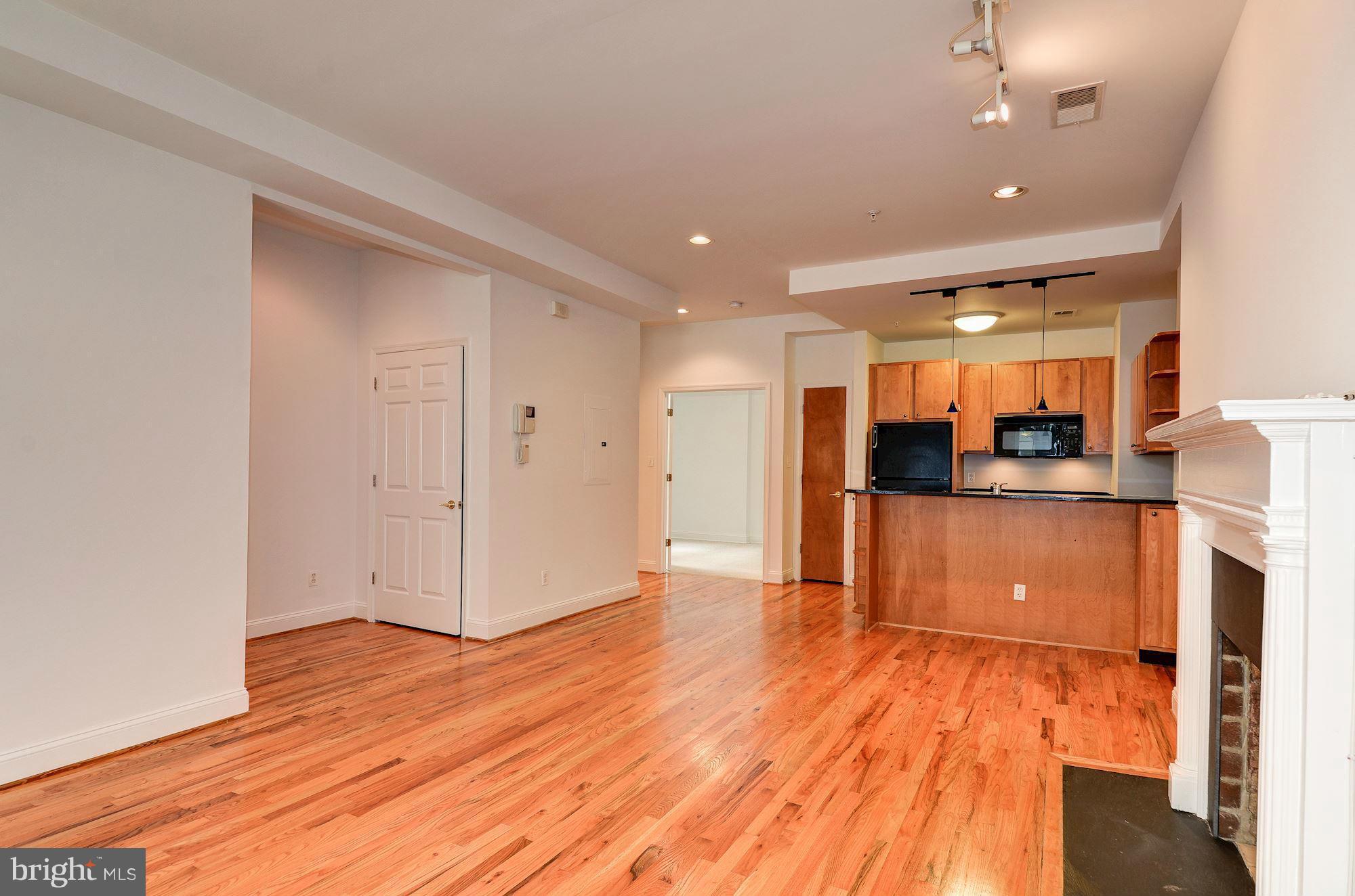2801 Connecticut Avenue Northwest, Unit 4 Washington, DC 20008 - Photo 5 of 19 Living Room and Entry Hall