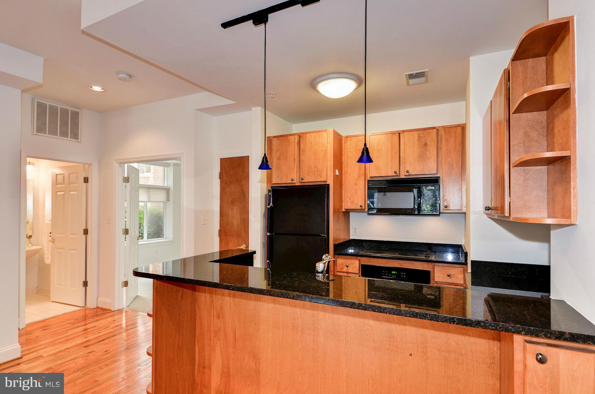 2801 Connecticut Avenue Northwest, Unit 4 Washington, DC 20008 - Photo 8 of 19 Kitchen with Uba Tuba granite countertops