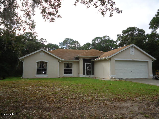 129 East Crisafulli Road Merritt Island, FL 32953 - Photo 1 of 41 01 Front