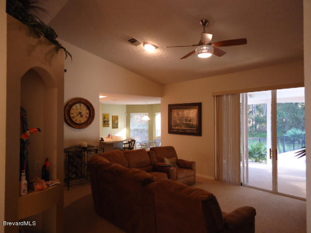 129 East Crisafulli Road Merritt Island, FL 32953 - Photo 2 of 41 02 Liv Rm Entrance