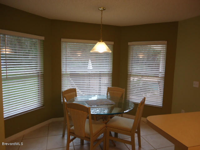 129 East Crisafulli Road Merritt Island, FL 32953 - Photo 11 of 41 11 Dinning