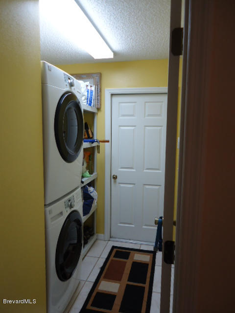 129 East Crisafulli Road Merritt Island, FL 32953 - Photo 17 of 41 17 Laundry Rm_Garage Entrance