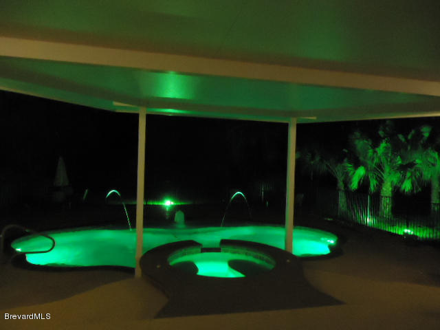 129 East Crisafulli Road Merritt Island, FL 32953 - Photo 30 of 41 30 Night Pool