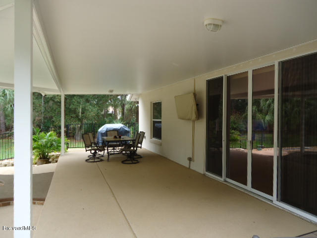 129 East Crisafulli Road Merritt Island, FL 32953 - Photo 32 of 41 33 Pool Upper Deck