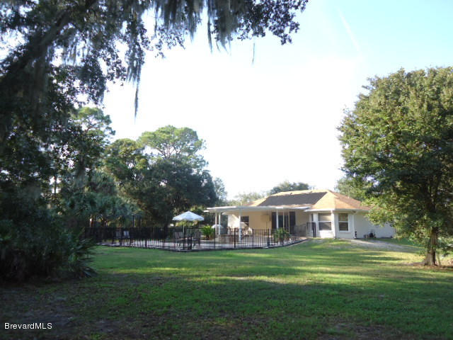 129 East Crisafulli Road Merritt Island, FL 32953 - Photo 33 of 41 34 Back Yard
