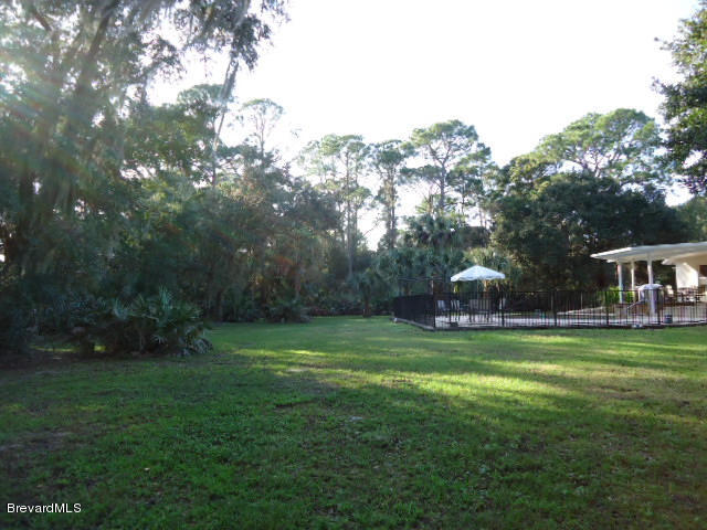 129 East Crisafulli Road Merritt Island, FL 32953 - Photo 34 of 41 35 Back Yard