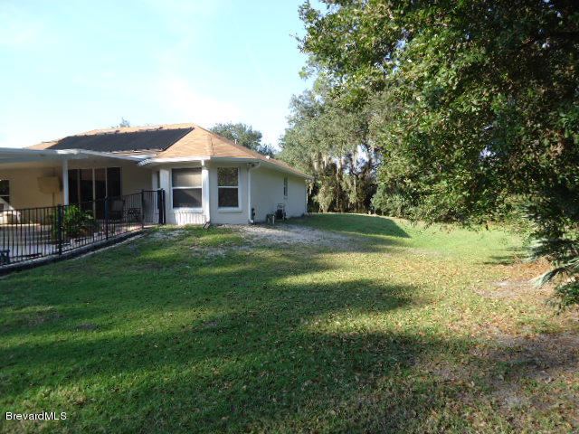 129 East Crisafulli Road Merritt Island, FL 32953 - Photo 35 of 41 36 East Side Yard