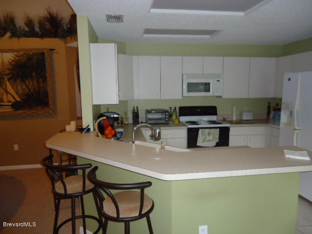 129 East Crisafulli Road Merritt Island, FL 32953 - Photo 7 of 41 07 Kitchen