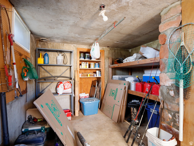 155 West Center Street Fillmore, UT 84631 - Photo 63 of 86 Utility room featuring concrete flooring and a partial exposed stone wall