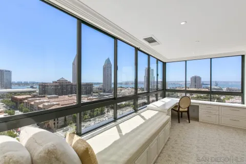 a large white room with furniture