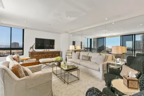 a living room with furniture and a flat screen tv