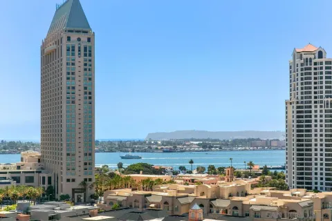 a view of a city with tall buildings