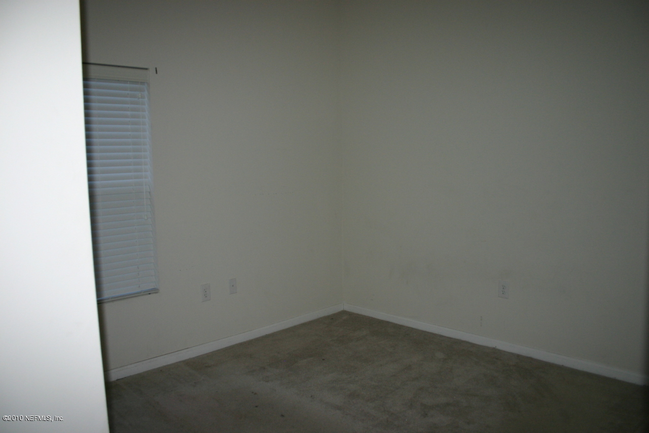 7920 Merrill Road, Unit 1002 Jacksonville, FL 32277 - Photo 11 of 18 a small space with a window