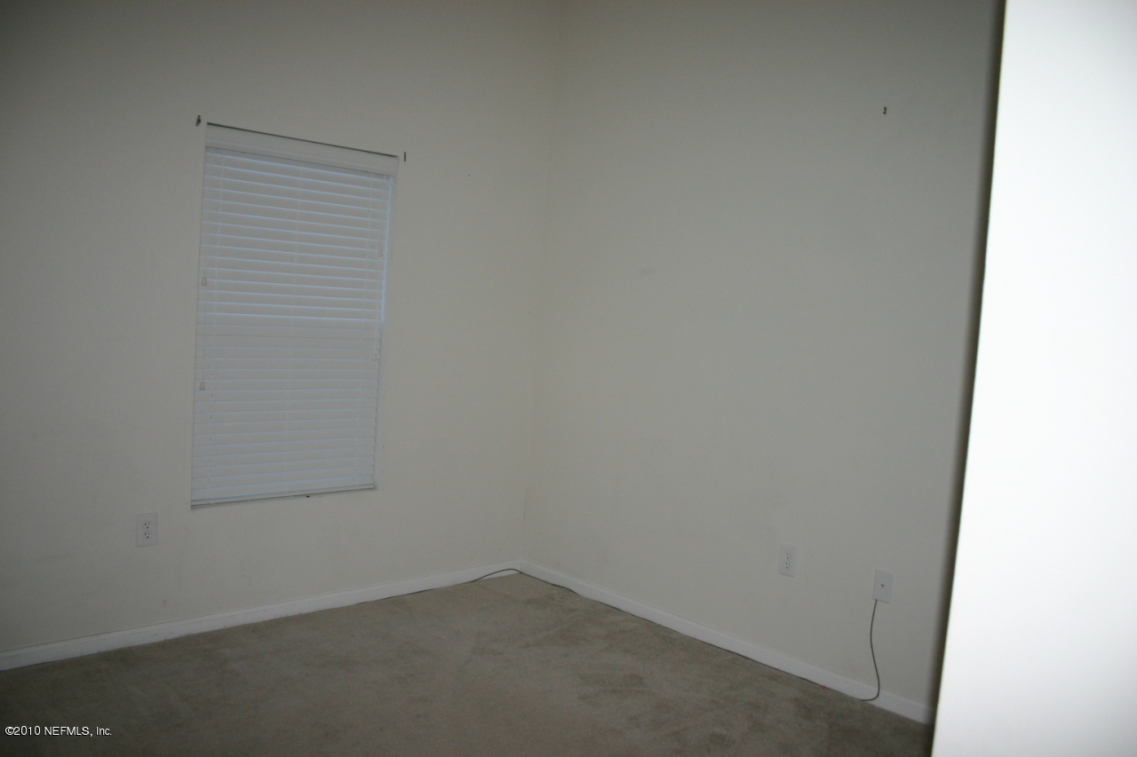 7920 Merrill Road, Unit 1002 Jacksonville, FL 32277 - Photo 10 of 18 a small space with a window