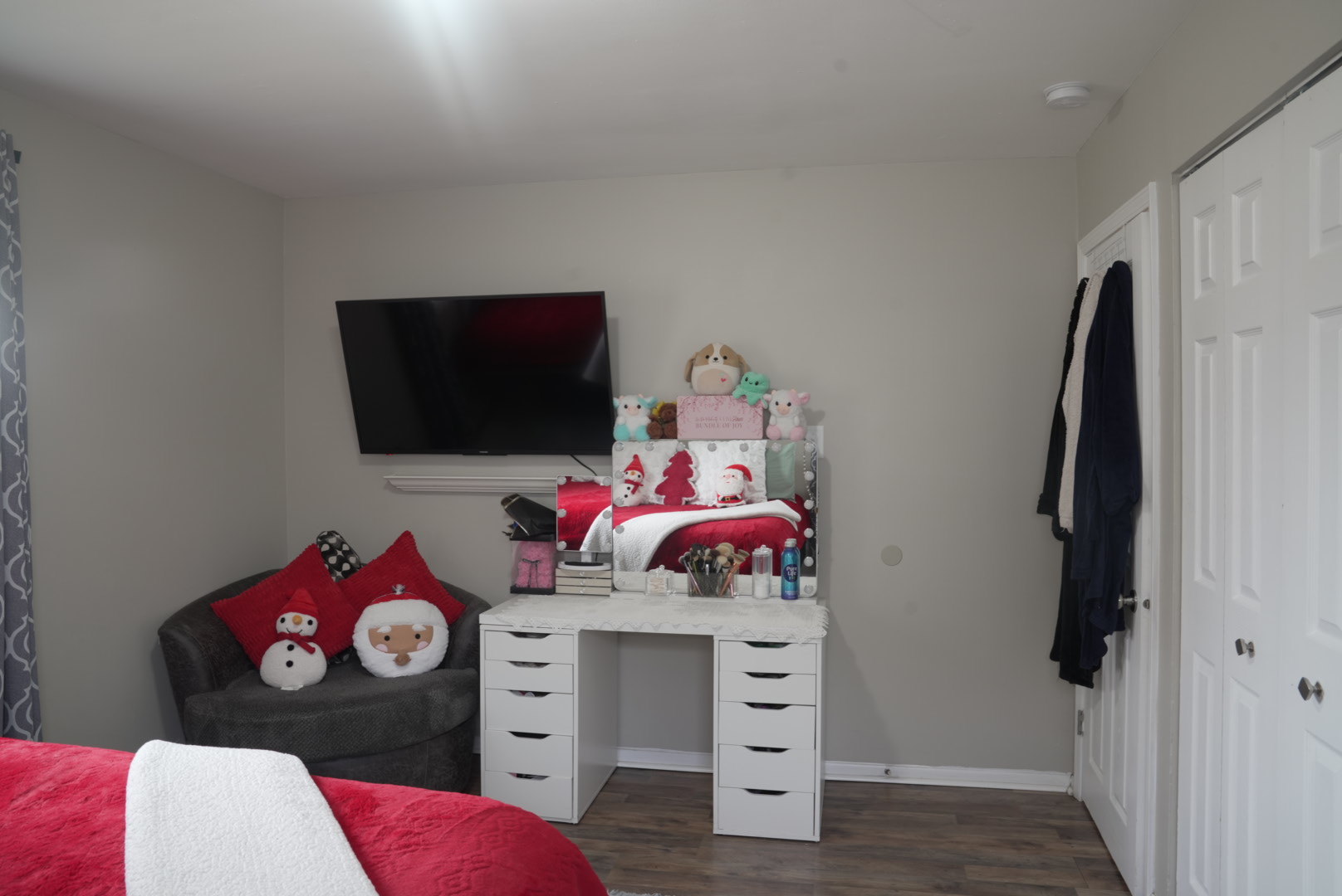 15315 Cherry Lane Markham, IL 60428 - Photo 18 of 34 a bedroom with a bed dresser and a flat screen tv