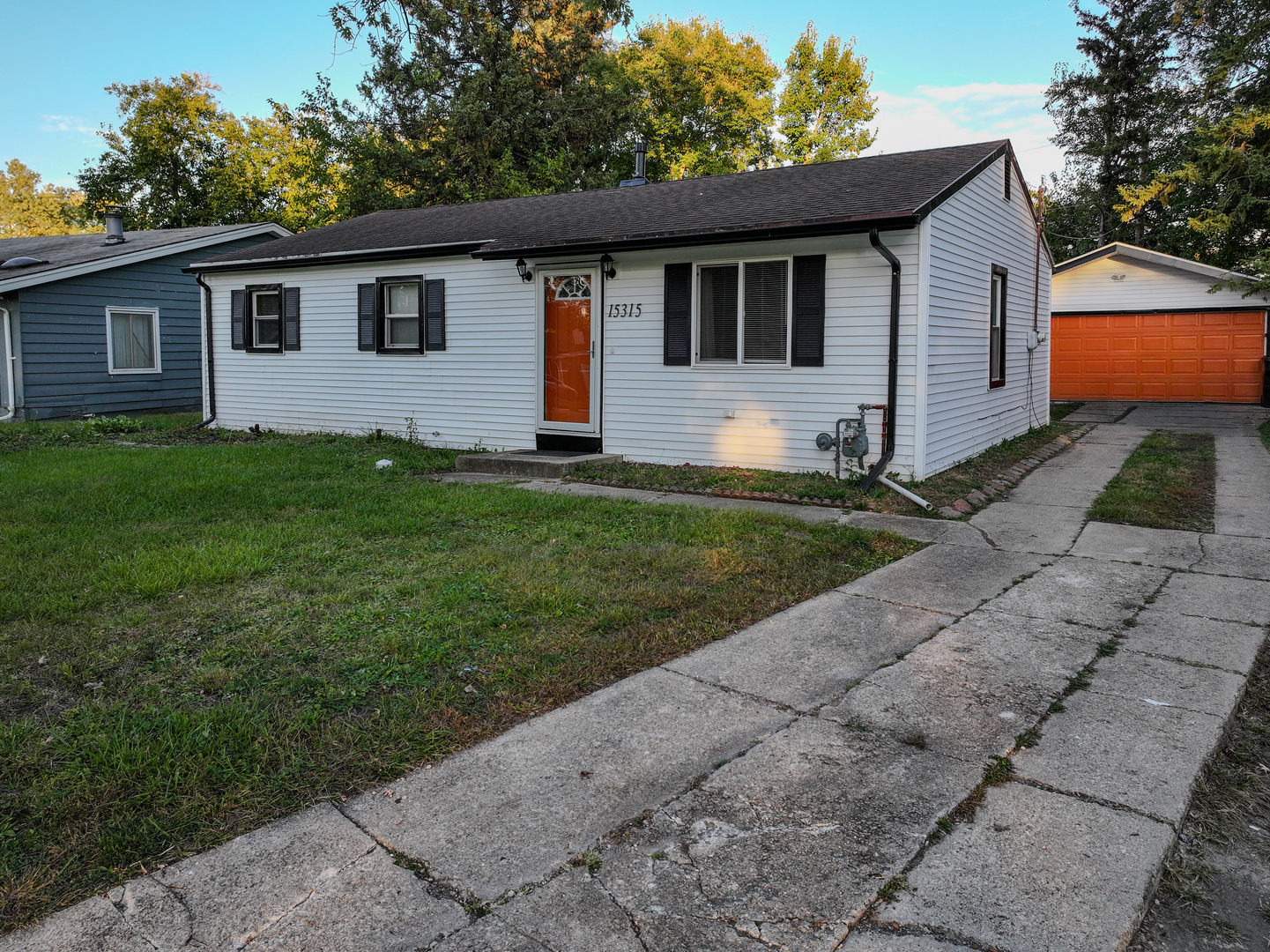15315 Cherry Lane Markham, IL 60428 - Photo 2 of 34 a front view of a house with a yard