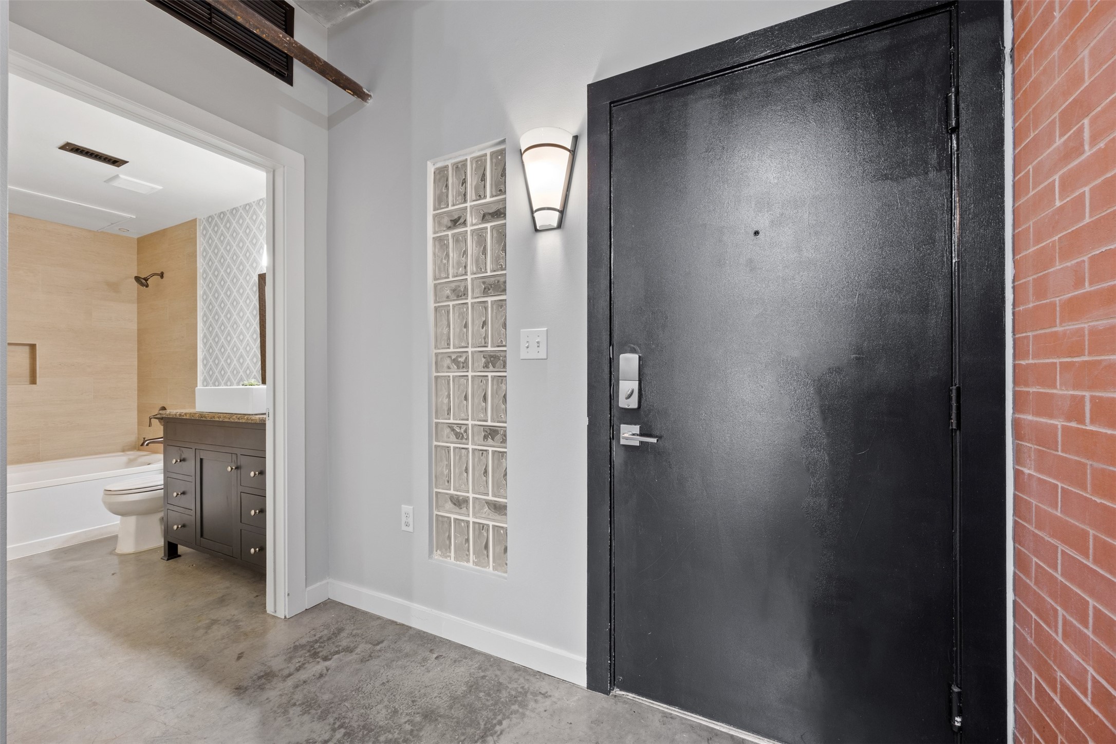 2000 Bagby Street, Unit 7414 Houston, TX 77002 - Photo 22 of 26 wooden floor and chair in a room