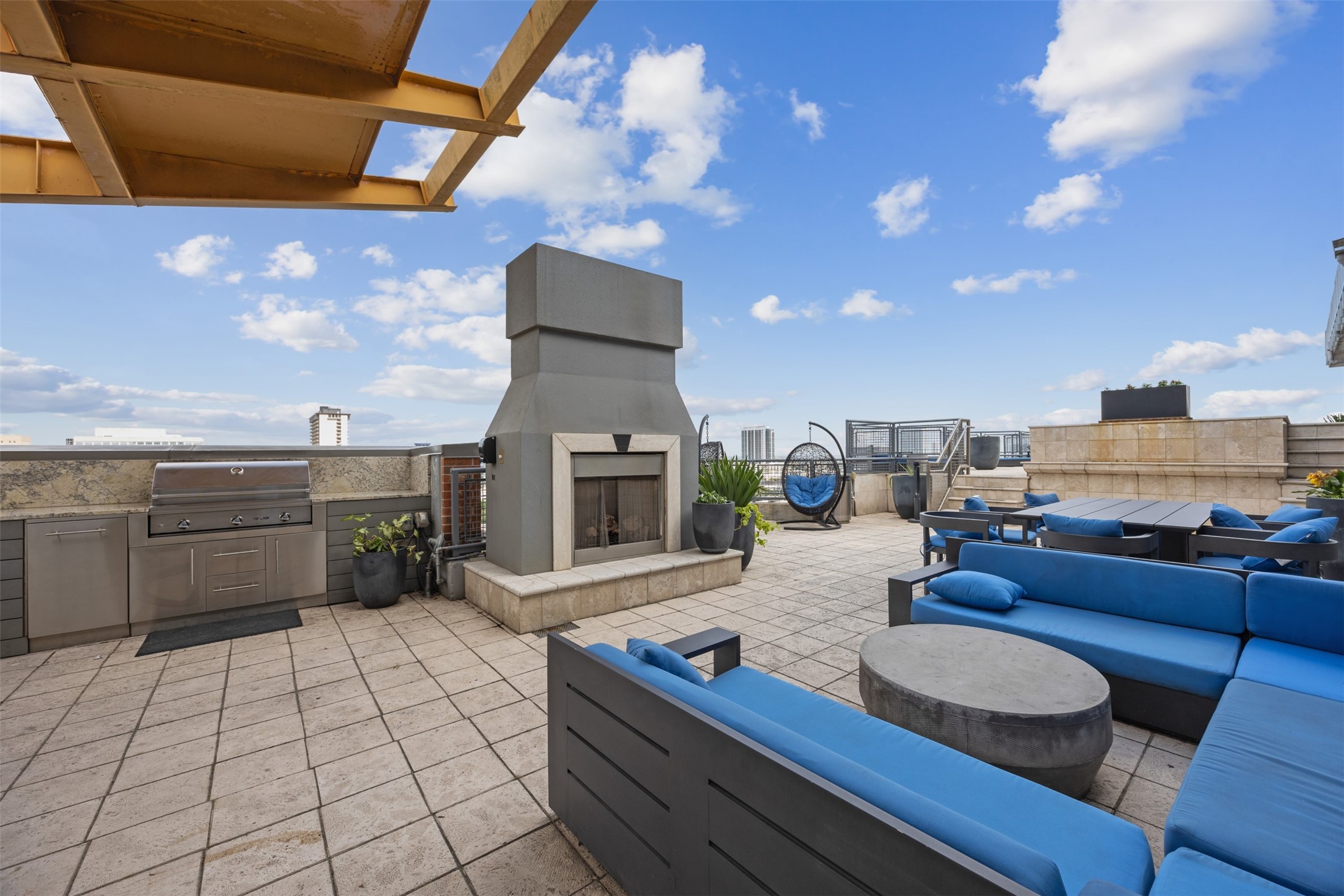 2000 Bagby Street, Unit 7414 Houston, TX 77002 - Photo 4 of 26 a living room with furniture and a fireplace