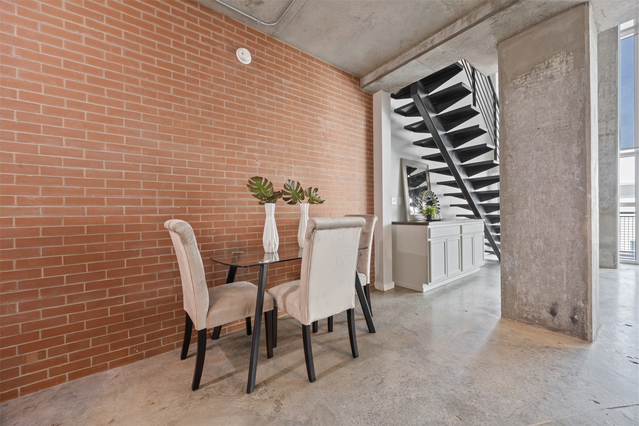 2000 Bagby Street, Unit 7414 Houston, TX 77002 - Photo 9 of 26 a view of a dining room with furniture and entryway