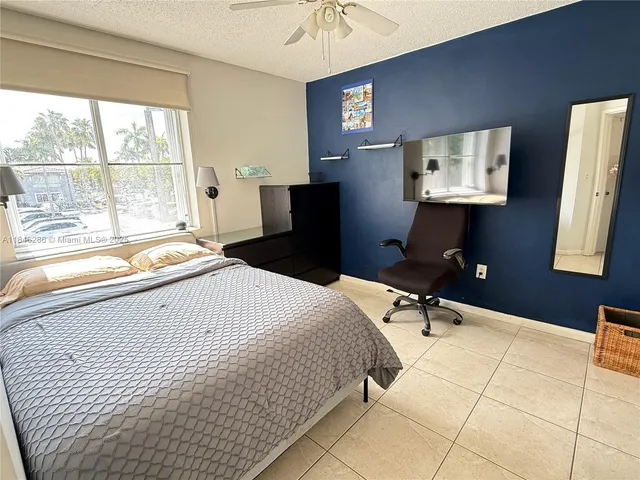 a view of a balcony with trees