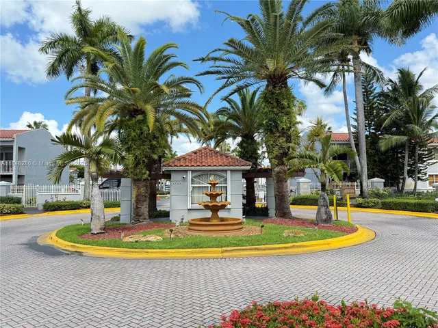 a view of a house with swimming pool