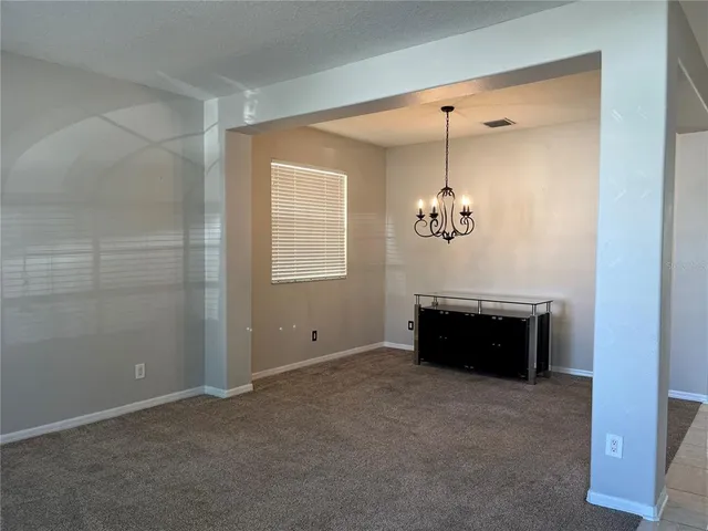 a view of a livingroom with furniture